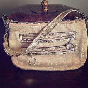 Pretty gold Coach Poppy